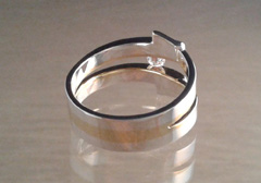 Ring, 925 zilver en 22 k goud, diamant in klemzetting